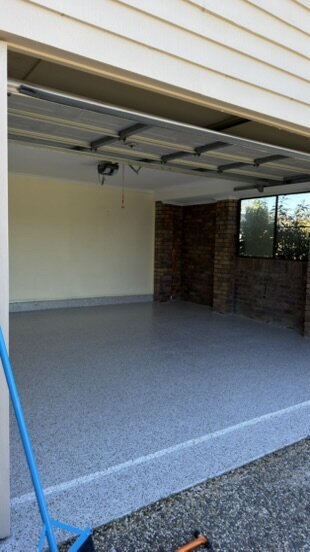 Flake epoxy coating in a residential double garage — Epox It Flooring