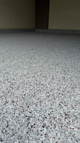 Flake epoxy garage floor with red and black fleck blend — Epox It Flooring
